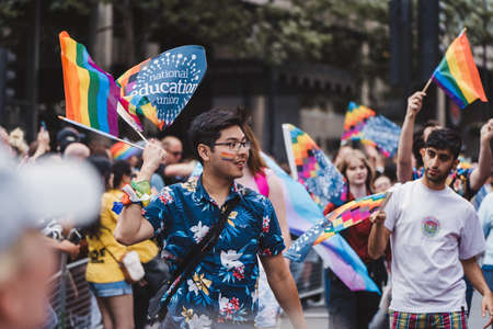 London / UK - 02/07/2022: People with flags and banners celebrating London LGBTQ Pride Paradeのeditorial素材