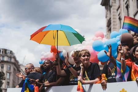 London / UK - 02/07/2022: People with flags and banners celebrating London LGBTQ Pride Paradeのeditorial素材