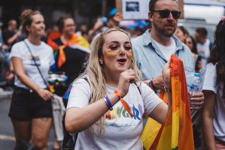 London / UK - 02/07/2022: People with flags and banners celebrating London LGBTQ Pride Paradeのeditorial素材