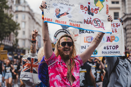 London / UK - 02/07/2022: People with flags and banners celebrating London LGBTQ Pride Paradeのeditorial素材