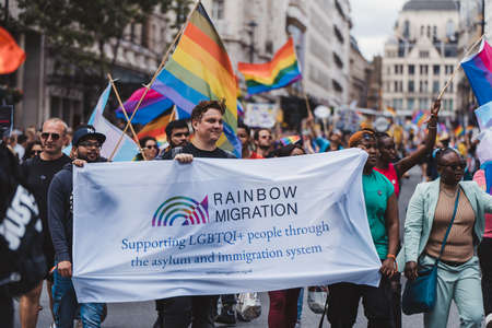 London / UK - 02/07/2022: People with flags and banners celebrating London LGBTQ Pride Paradeのeditorial素材