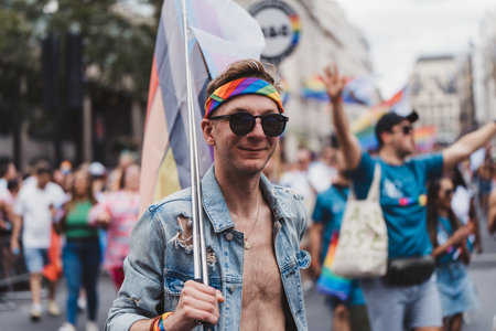 London / UK - 02/07/2022: People with flags and banners celebrating London LGBTQ Pride Paradeのeditorial素材