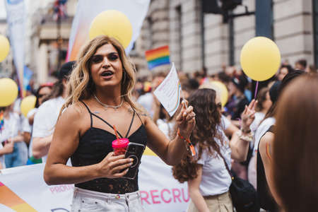 London / UK - 02/07/2022: People with flags and banners celebrating London LGBTQ Pride Paradeのeditorial素材