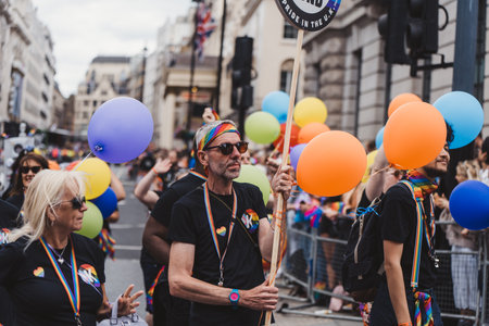 London / UK - 02/07/2022: People with flags and banners celebrating London LGBTQ Pride Paradeのeditorial素材