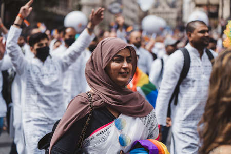 London / UK - 02/07/2022: People with flags and banners celebrating London LGBTQ Pride Paradeのeditorial素材