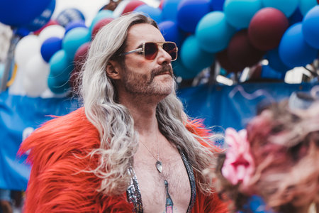 London / UK - 02/07/2022: People with flags and banners celebrating London LGBTQ Pride Paradeのeditorial素材
