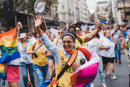 London / UK - 02/07/2022: People with flags and banners celebrating London LGBTQ Pride Paradeのeditorial素材