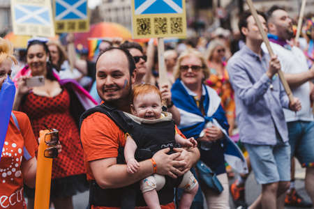 London / UK - 02/07/2022: People with flags and banners celebrating London LGBTQ Pride Paradeのeditorial素材