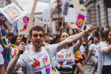 London / UK - 02/07/2022: People with flags and banners celebrating London LGBTQ Pride Paradeのeditorial素材