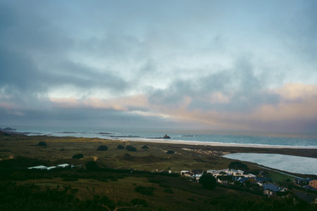 A beautiful view of La Rocco Tower from sand dunes in western Jersey backing the southern end of St Ouen's Bayの写真素材