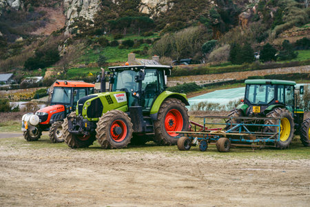 Jersey Island, Channel Island | UK - 2022.01.29: Tracktors at the farm on Jersey Island, UK, Channel islandのeditorial素材