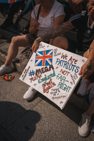 Trafalgar Square, London - UK - 2024.07.27: People with British flags are gathering at the March for Freedom, March for Britainのeditorial素材