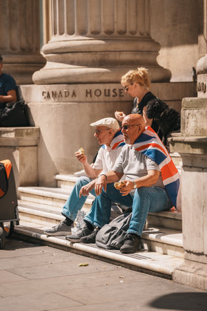 Trafalgar Square, London - UK - 2024.07.27: People with British flags are gathering at the March for Freedom, March for Britainのeditorial素材