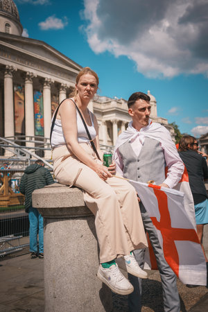 Trafalgar Square, London - UK - 2024.07.27: People with British flags are gathering at the March for Freedom, March for Britainのeditorial素材