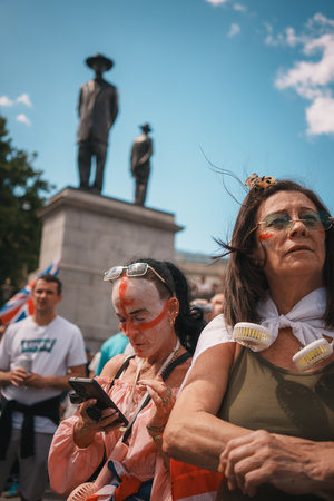 Trafalgar Square, London - UK - 2024.07.27: People with British flags are gathering at the March for Freedom, March for Britainのeditorial素材