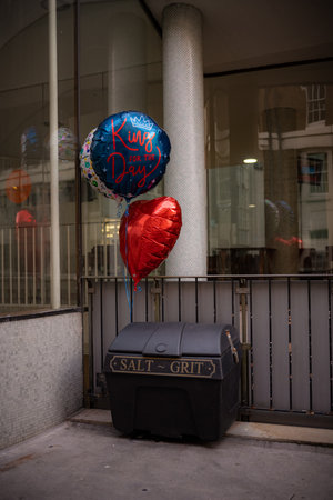 King for the day, Birthday ballon tied on the street to the fenceの写真素材