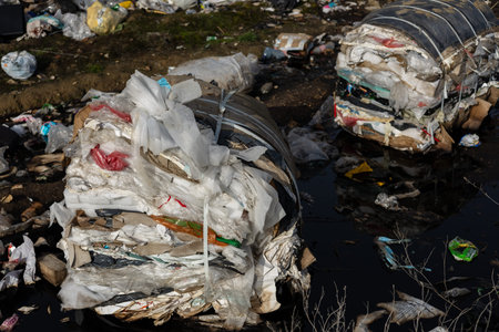 Mountains of plastic waste at a landfill starkly illustrate pollution and highlight serious...