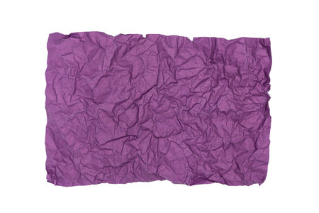 Sheet of purple crumpled paper isolated on white.の写真素材