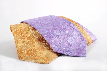 these are Italian bright men's ties on a white backgroundの写真素材