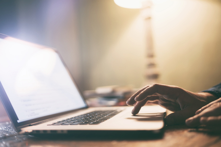 Man with laptop at homeの写真素材