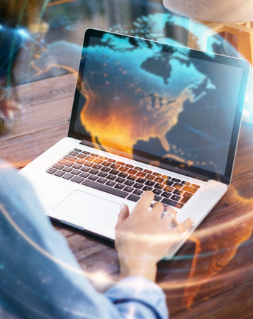 Young beautiful woman working with a laptop. Global network concept