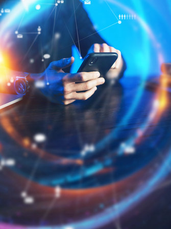 Man pointing on smartphone screen, chatting in social networks, meeting website, searching internet, sending sms, using text messenger or online banking. Close up of male hands. Remote workの写真素材