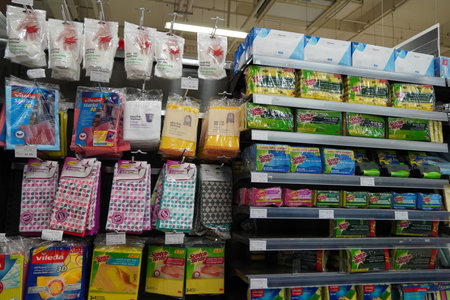 Scotch Brite sponges and other brands cleaning cloth, scrubs displayed for sale. Microfiber cleaning...