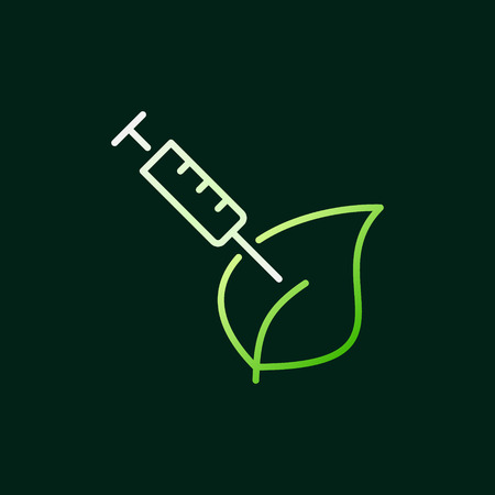 Syringe with green leaf vector modern outline icon or signのイラスト素材