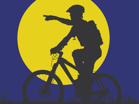 mountain biker in moonlight (vector eps format)のイラスト素材