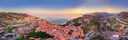 Aerial drone view of Ventimiglia, Liguria, Italy,province of Imperia . Beautiful panoramic aerial view of the attractions of the old upper Ventimiglia Cala Del Forte, owned by Monaco Ports.の写真素材