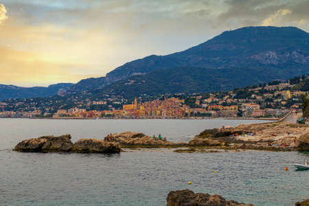 Ventimiglia, Liguria, province of Imperia, Italy: August 10, 2021. Wild Balzi Rossi beach, border with France with a view of Menton.のeditorial素材
