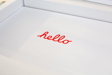 Bologna, Italy: February 14, 2022.Unboxing the new modern Apple pink iMac M1 ,2021 laptop out of the...