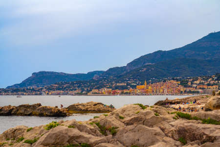 Menton, France, Provence-Alpes, Cote d'Azur. Evening panoramic view of the colorful old town. Beautiful houses in the old part French Riviera: August 10,2021の写真素材