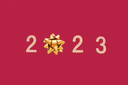 Happy New Year 2023. Golden numbers with rhinestone text 2023 isolated trending PANTONE 18-1750 Viva Magenta color background. Beautiful bright design element for greeting card and holiday flyer.の写真素材