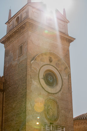 Torre dellOrologio, an astronomical clock in Piazza delle Erbe in Mantua, Italy.の写真素材