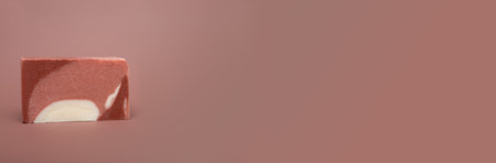 Natural multi-colored solid handmade soap a mocha mousse background. Eco-friendly natural handmade cosmetics. Natural spa products and decor for bathの写真素材