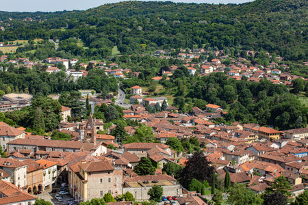 Aerial view of Avigliana, Italy, Piedmont , Turin,Italy A beautiful town with a medieval castle and red-roofed houses and trees on a sunny day.の写真素材