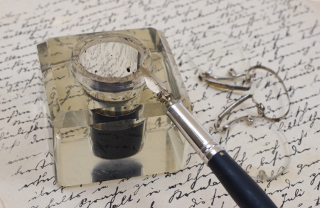 vintage background with retro ink pen on old aged handwriteln letterのeditorial素材