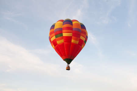 Colorful hot air balloon in morning skyの写真素材