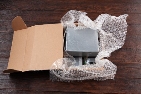 Hand made bomb with c4 and cell phone module in a cardboard boxの写真素材