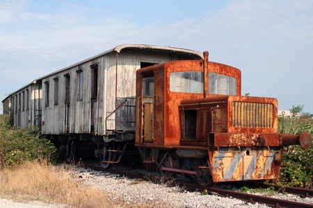 old train in an abandoned railの写真素材