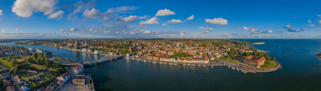 Aerial view of the castle and port of Sonderborg with a maritime guest on the water.