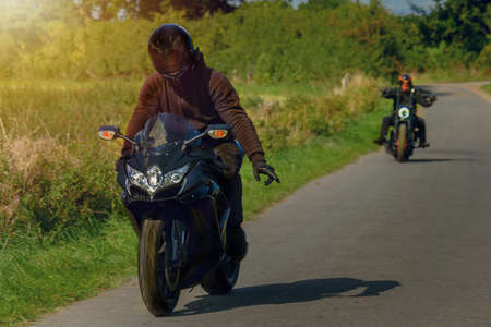 Scene in motorcycling in fine weather, in nature on asphalt road.の写真素材