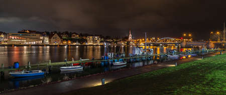 Night view on the Sonderborg. Panorama view of city and harbor by Christmas time in Sonderborg, Jutland, Denmark, Europe.の写真素材