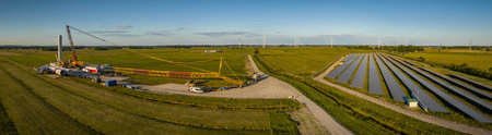 Solar panels in a field in Holland. Panoramic view.の写真素材
