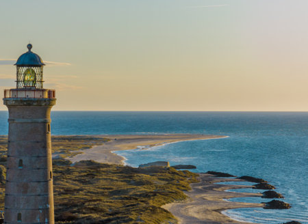 Beach coastline with the famous Skagen Gray Lighthouse, Skagen GrÃ¥ Fyr, Skagen, Grenen in North Jutland in Denmark, Skagerrak, North Sea, Baltic Sea. Upper tower platform, lanternの写真素材