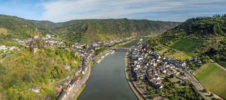 Panorama of Cochem on Moselle in Rhineland Palatinate, Germany. Historic Reichsburg Castle towers...