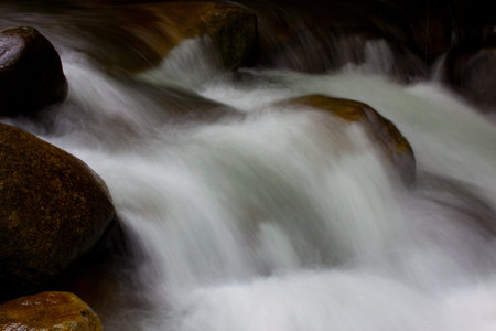 waterfall in the deep forest on mountain 