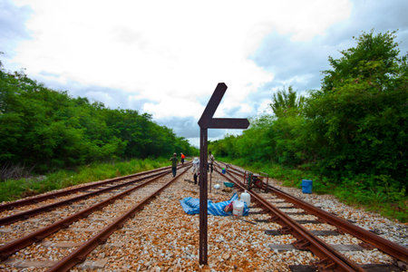 railway Workers repairing railway on hot summer dayのeditorial素材