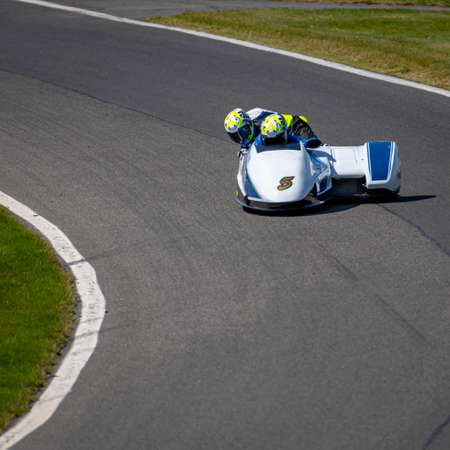 A shot of a racing sidecar as it corners on a track.の写真素材
